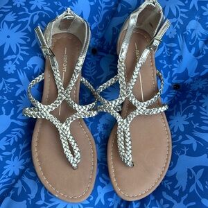 Report Golden braided Gladiator shiny gold sandals